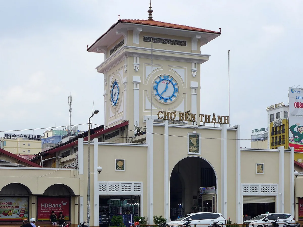 Ben Thanh Market building in Ho Chi Minh City with its clock tower, seen from the street